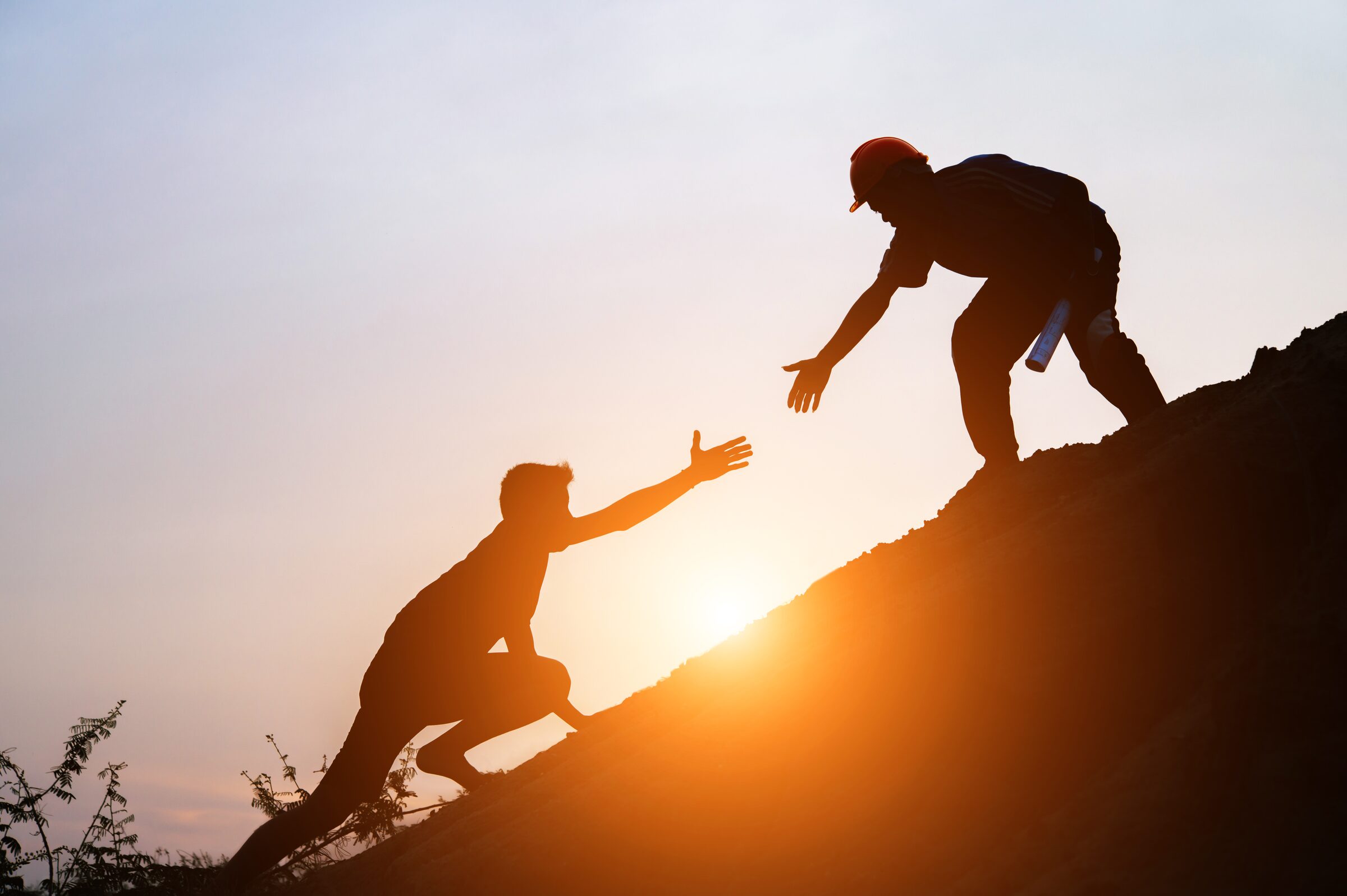 One professional helping another move toward a shared goal