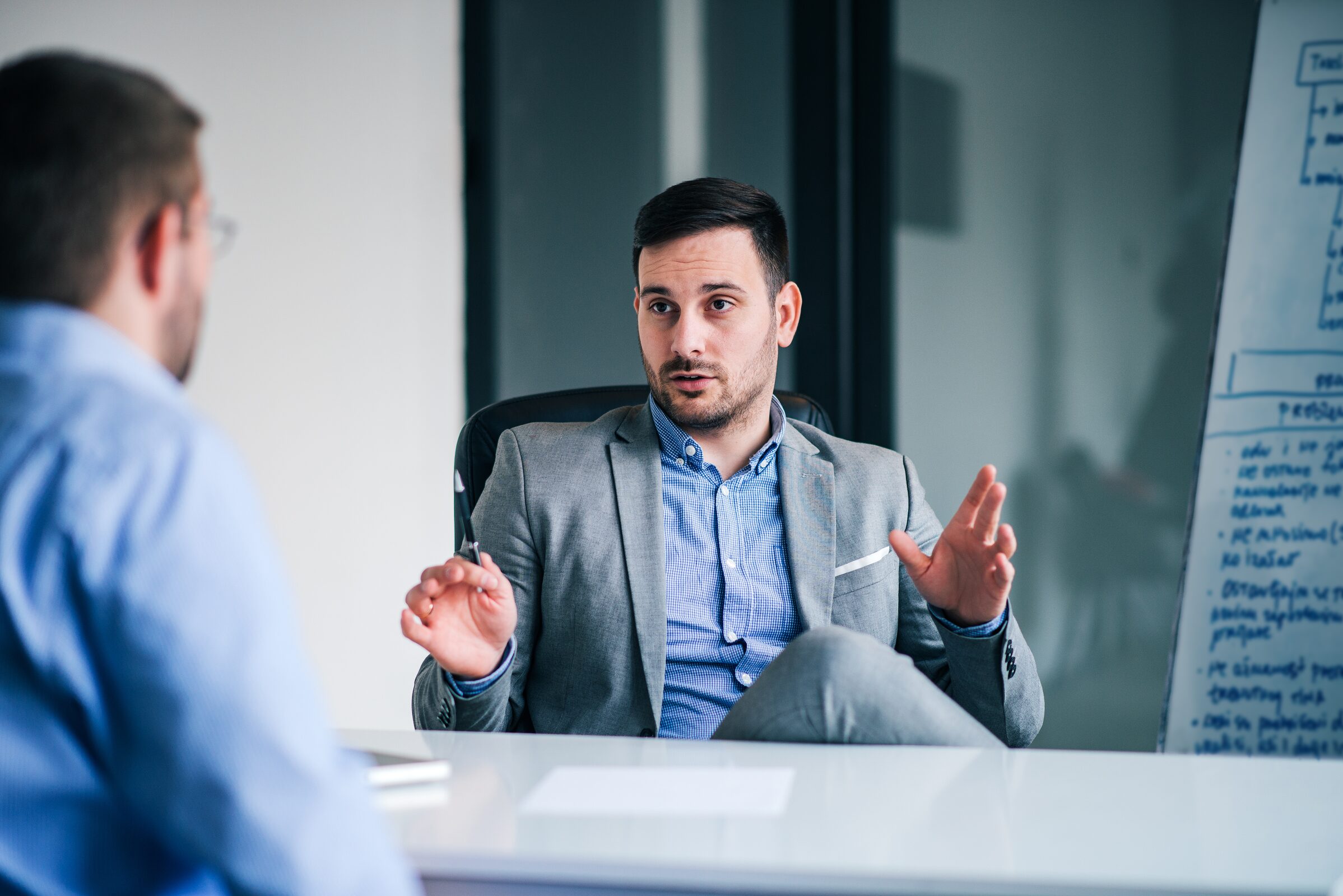 Business adviser answering a client's questions
