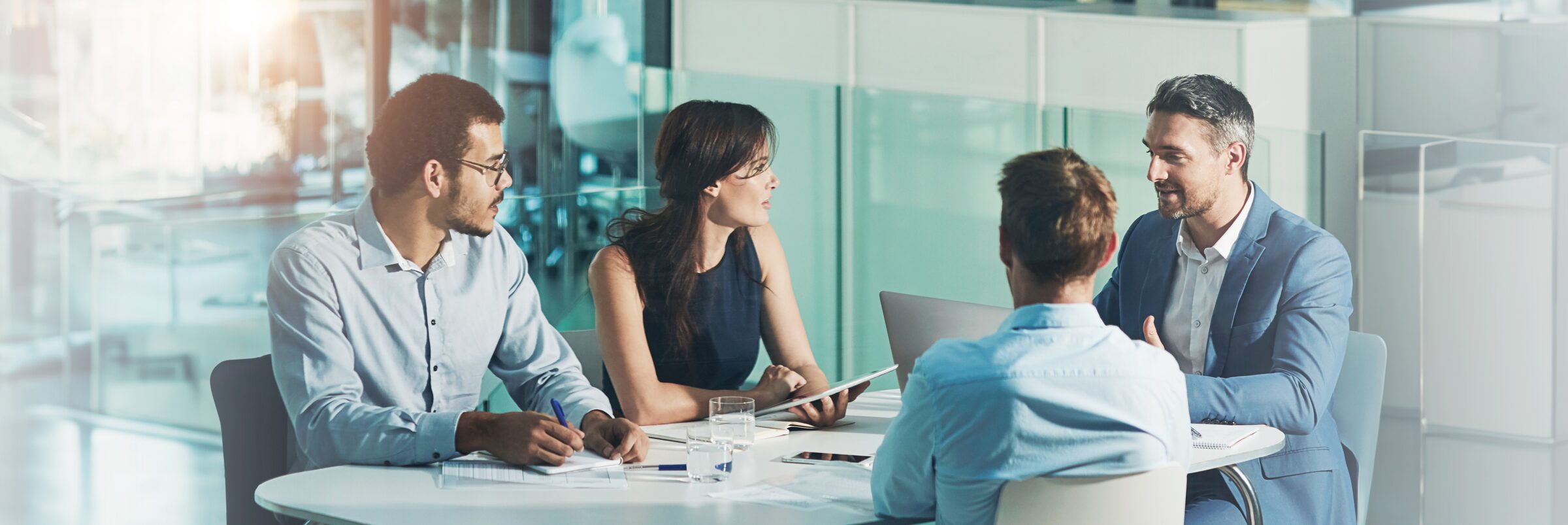 Consultants working with business leaders in a strategy session
