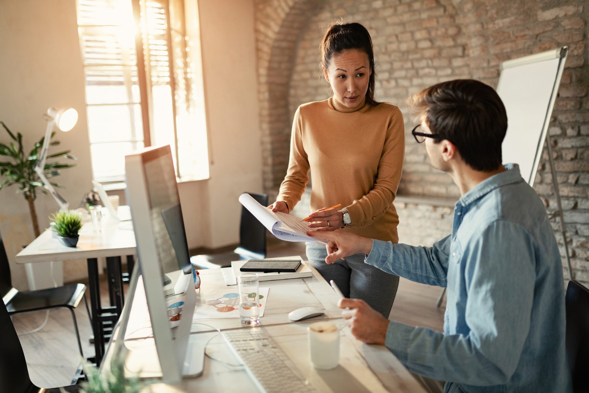Business professionals discussing a consulting engagement